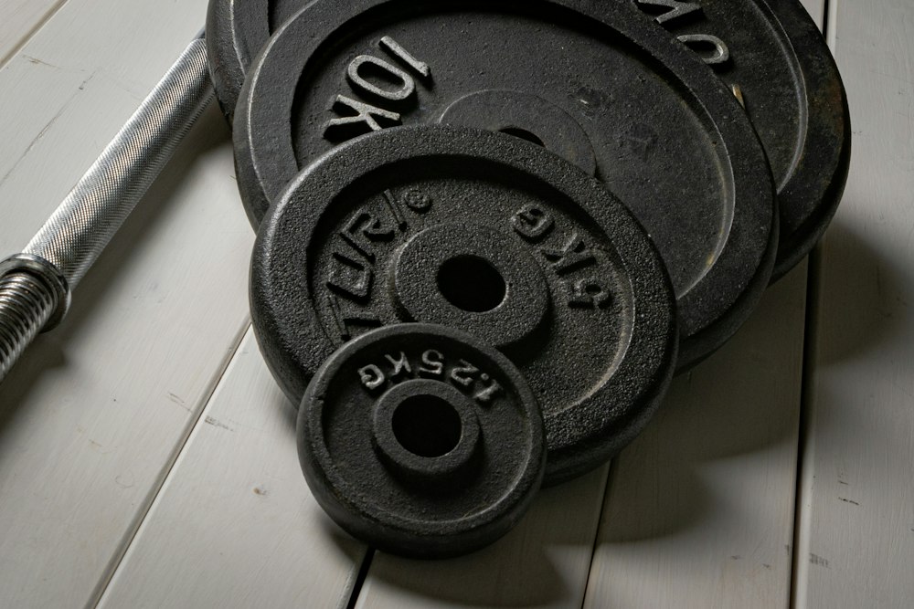 Close-up of barbell collars and weight plates