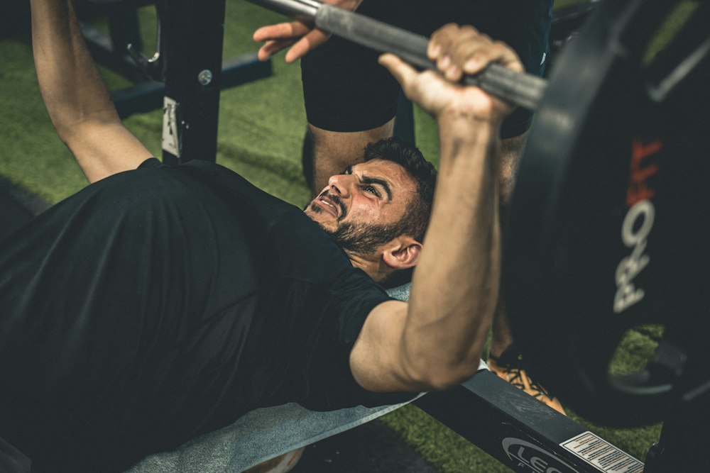 Lifter performing a barbell bench press