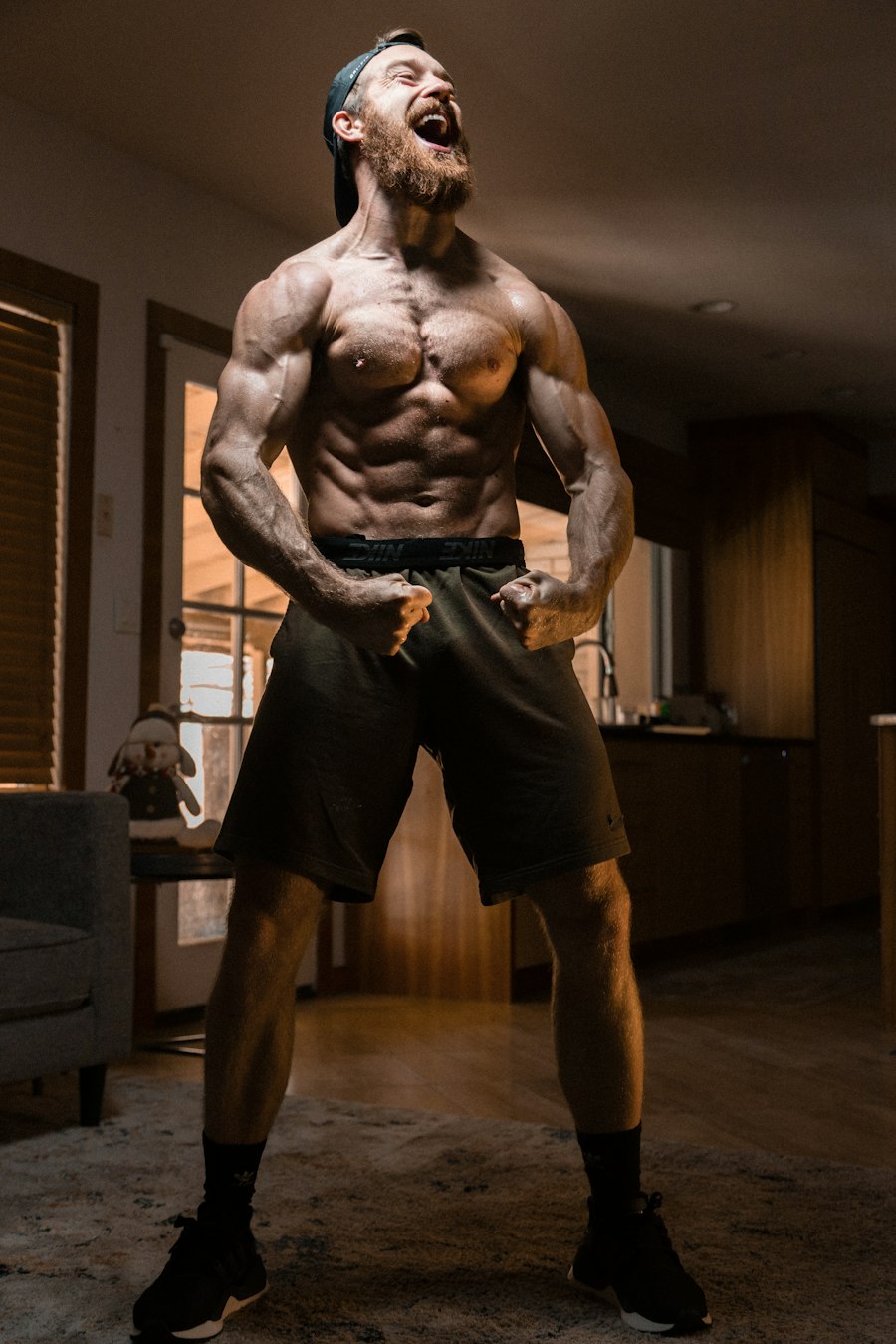 Bodybuilder practising a physique pose